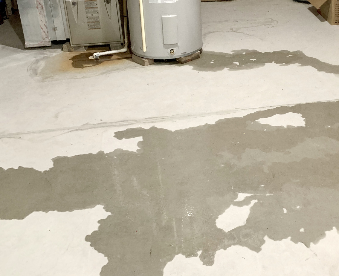Water Leaking on Concrete Floor