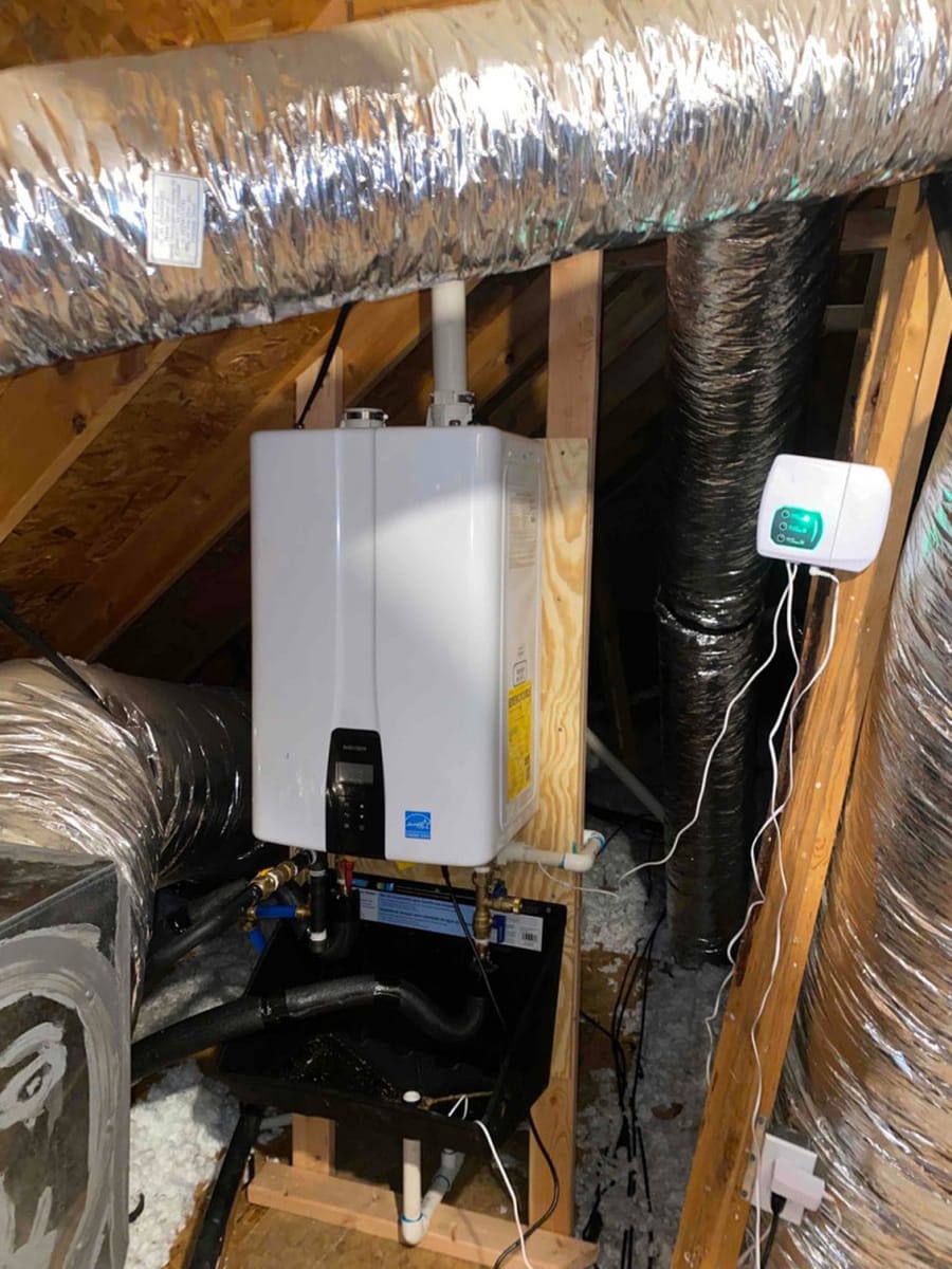 plumber connecting drain lines and plumbing pipes