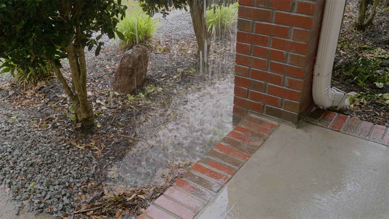 clogged rain gutter that is not properly draining