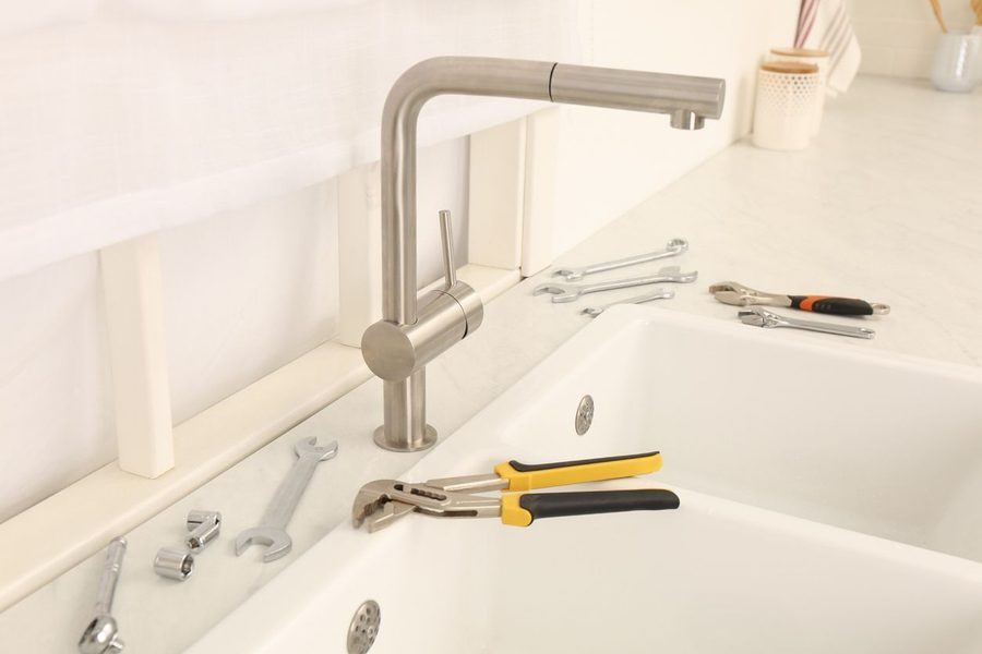 new faucet being installed in Denton County home