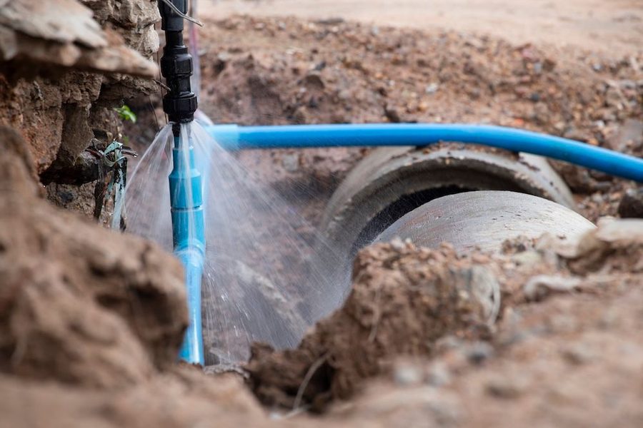 leaking water line in someone's yard